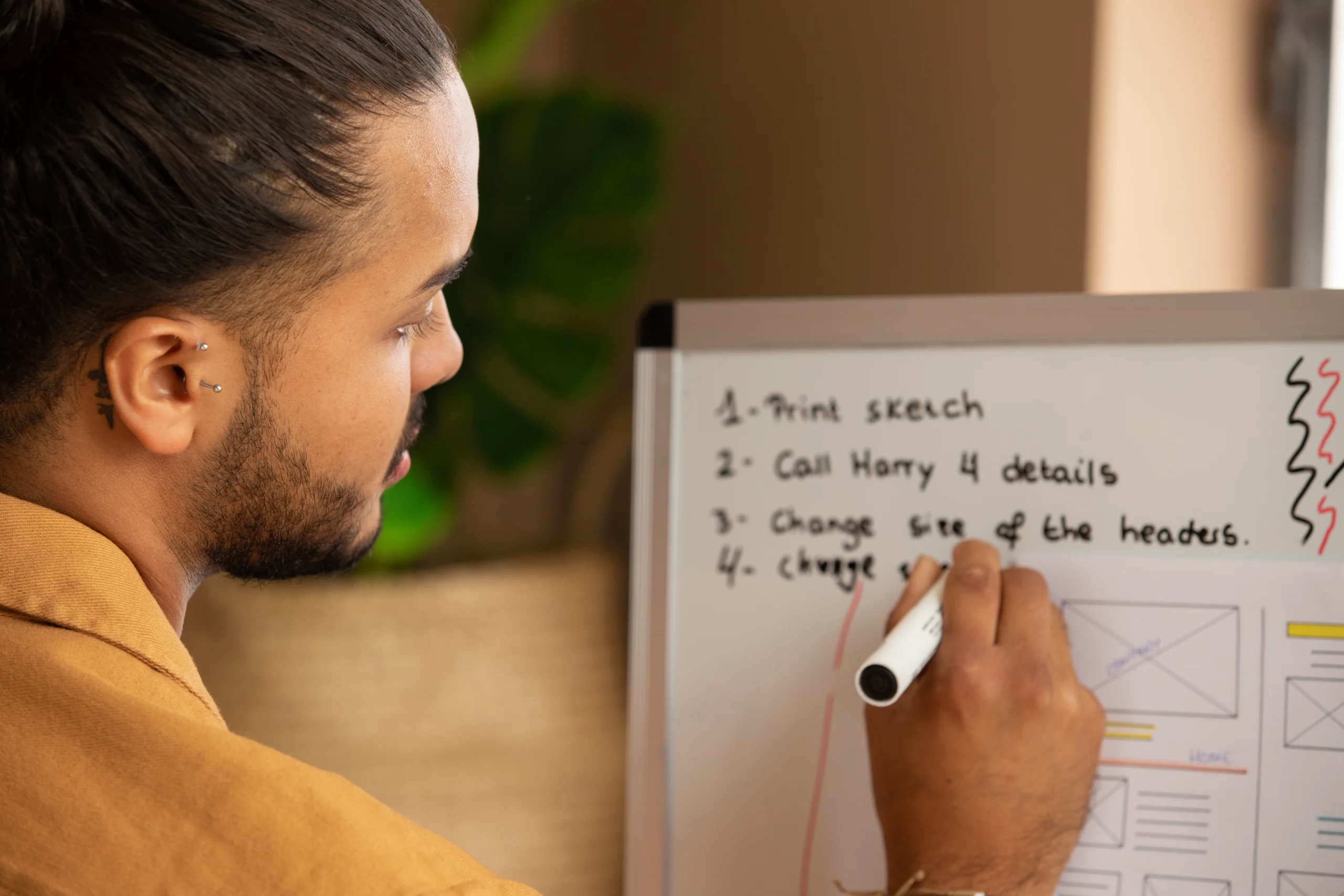 A man writing a checklist