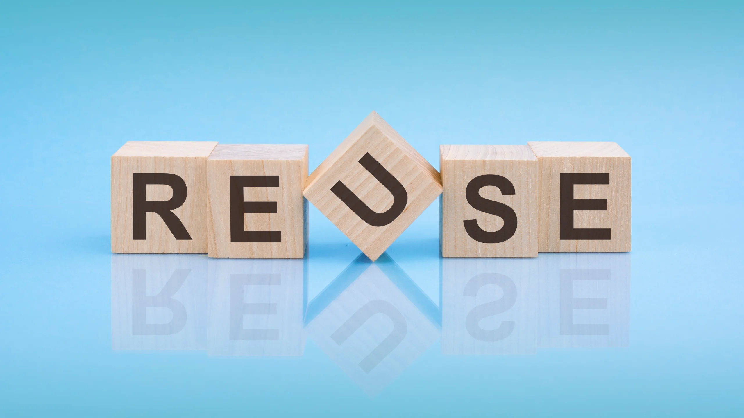 word REUSE on wooden blocks